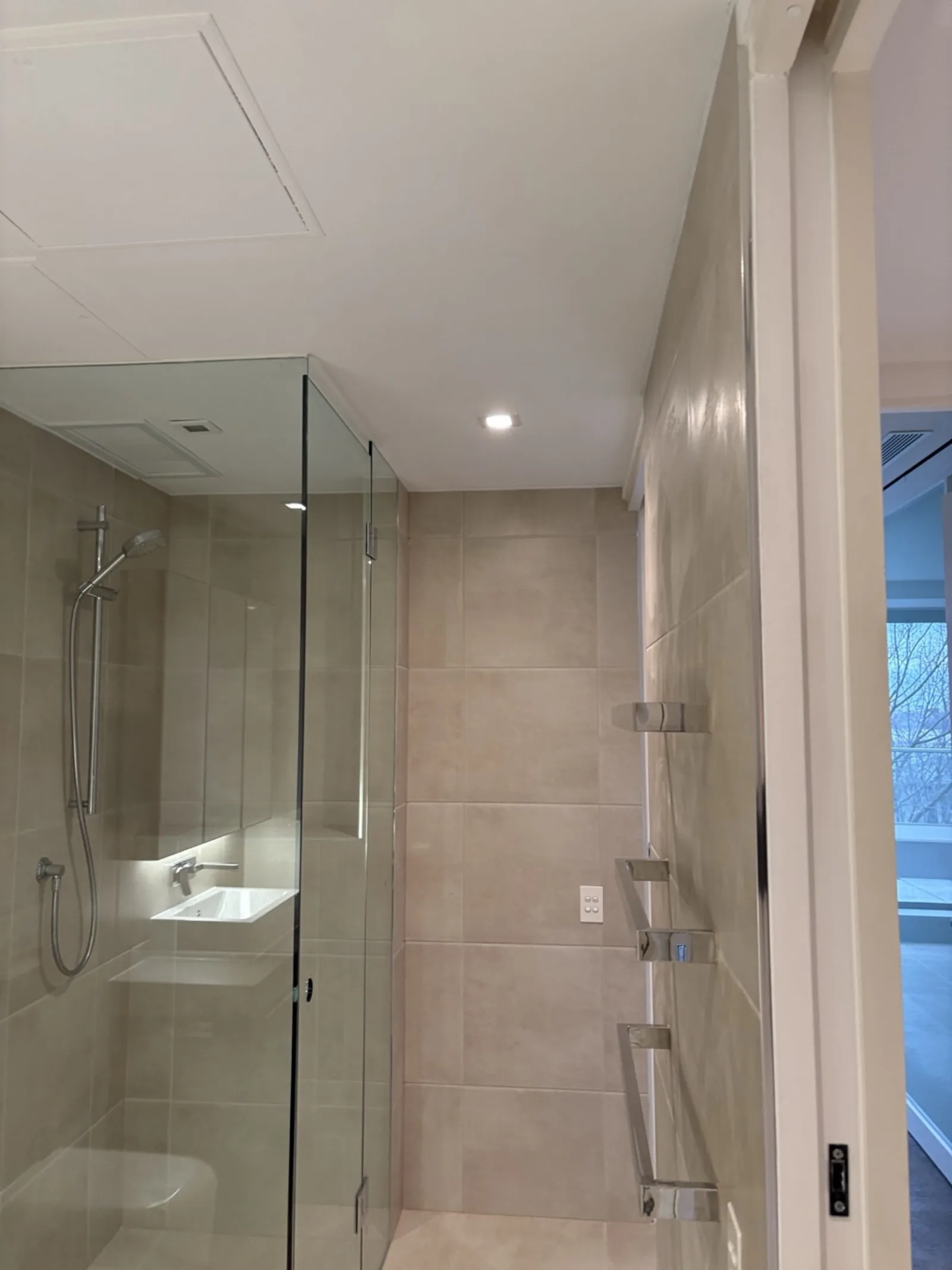 Tiled shower with glass screen by JT Handyman in East Melbourne