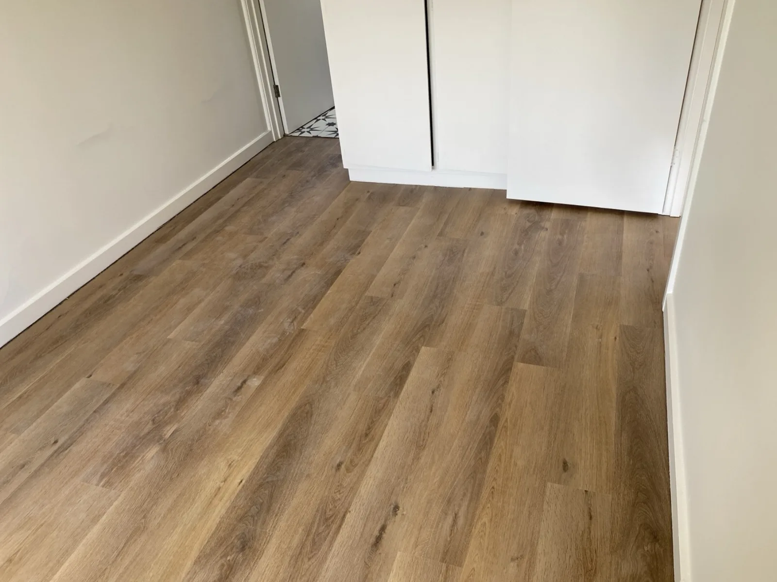 Timber-look flooring by JT Handyman in Brighton East